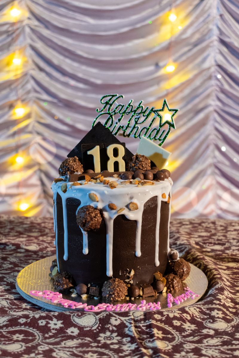 A chocolate cake decorated for a birthday